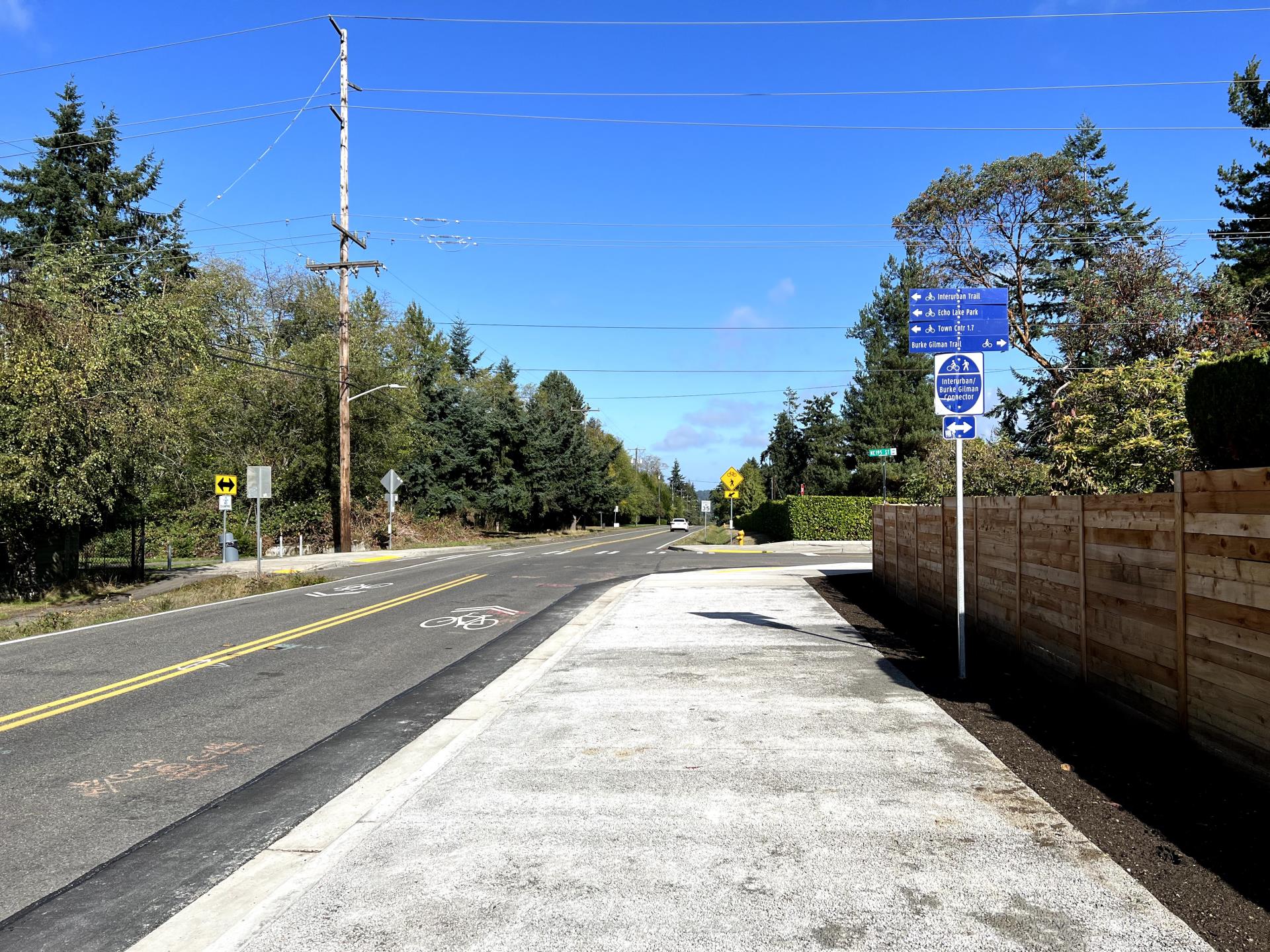 After the new shared-use sidewalk on 1st Avenue NE near the intersection with NE 195th Street