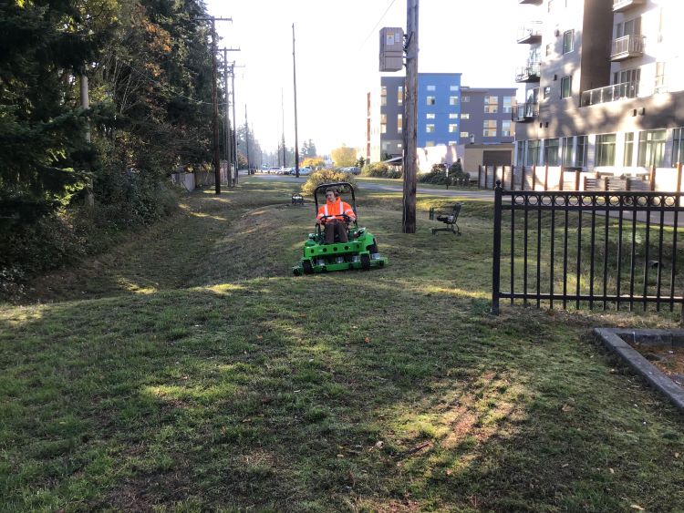 Employee Utilizing Mean Green EVO Electric Mower