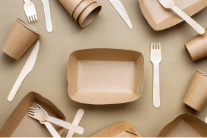 Brown and beige compostable utensils and food containers.